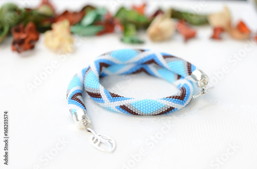 Blue bead crochet necklace with geometrical pattern