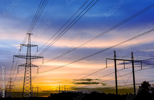 Silhouette of high voltage power lines