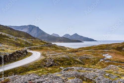 Asphalt curved road along mountain  Tromso  Norway
