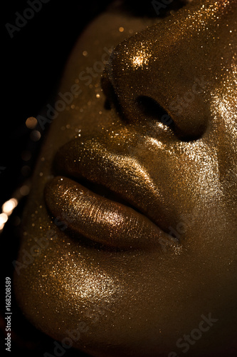 female lips with glitter and spangle  shallow DOF 