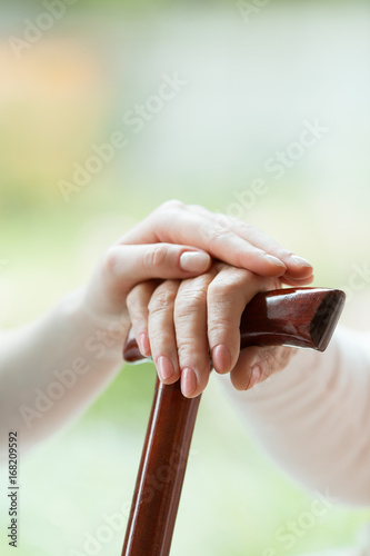 Plakat Caregiver's hand on elder's hand