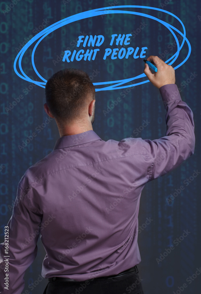 Business, Technology, Internet and network concept. Young businessman working on a virtual screen of the future and sees the inscription: Find the right people