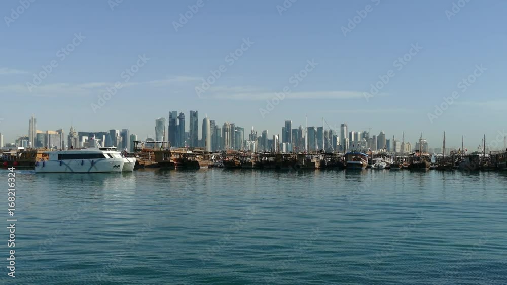 Modern ferry leaving in the morning Dhow Harbour in Doha Qatar Modern ferry leaving in the morning Dhow Harbour in Doha Qatar