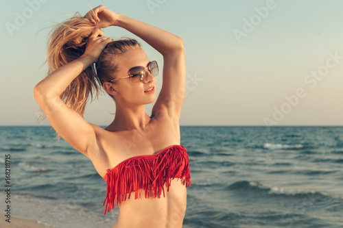 Portrait of a beautiful girl at the sea