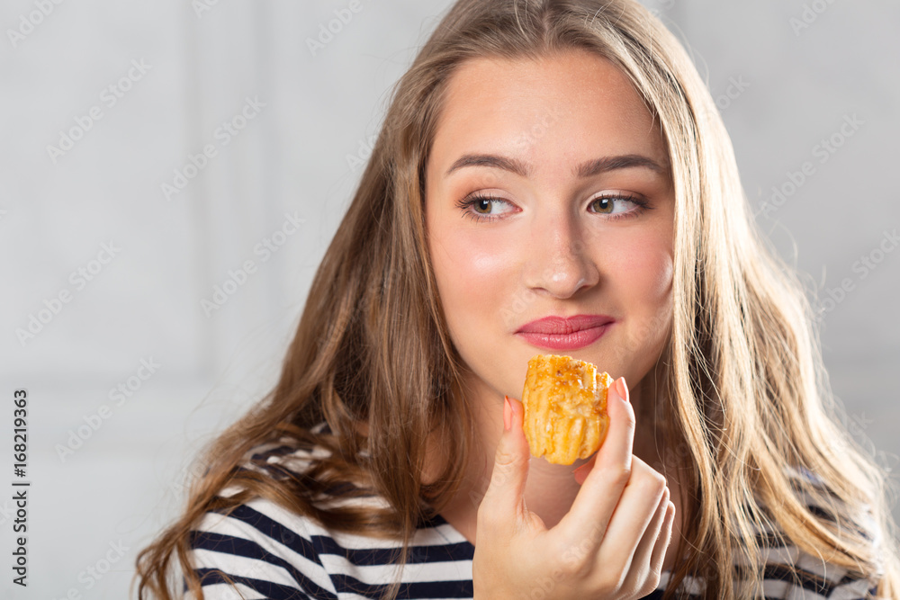 Beautiful smiling young woman with a cake Beautiful smiling young woman with a cake
