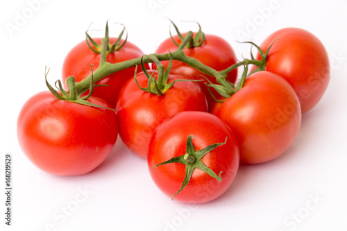fresh red tomatoes isolated on white