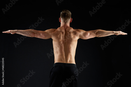young man or bodybuilder with bare torso