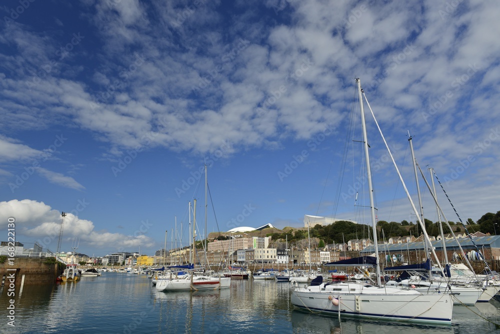 Old St Helier Marina, Jersey, U.K.  Wide angle image of a harbour at high tide in the Summer.