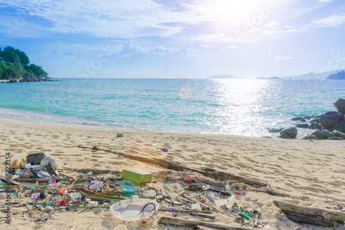 Lots of junk on the beach And beautiful sea sky