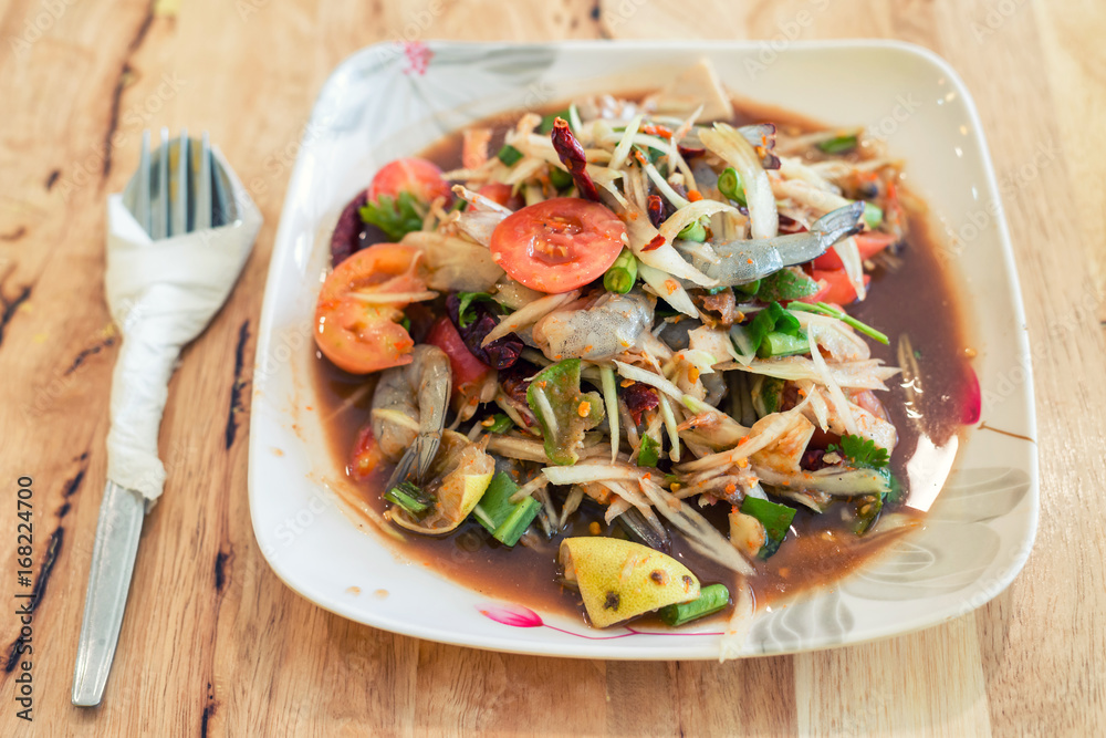 Papaya salad. Traditional spicy Thai food.