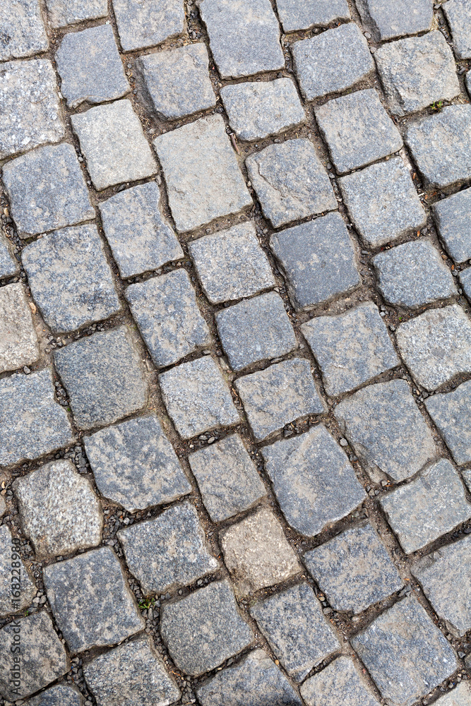 Stone pavement in Prague by day. Stone pavement in Prague by day.