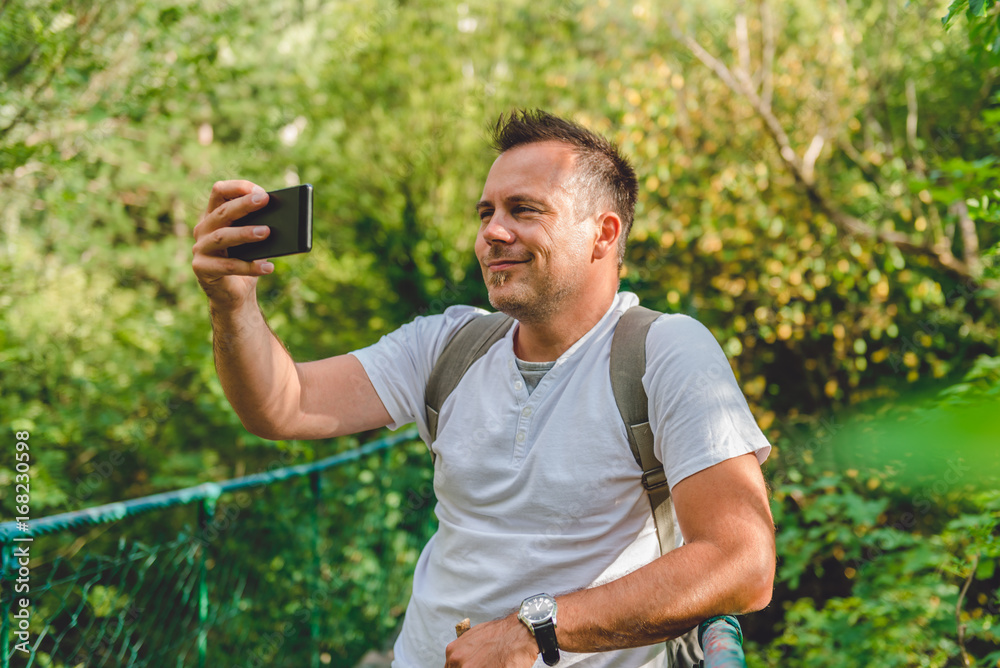 Hiker taking photo Hiker taking photo