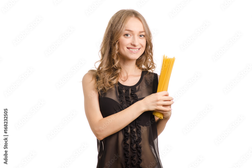 Spaghetti pasta in the hands of a young woman Spaghetti pasta in the hands of a young woman