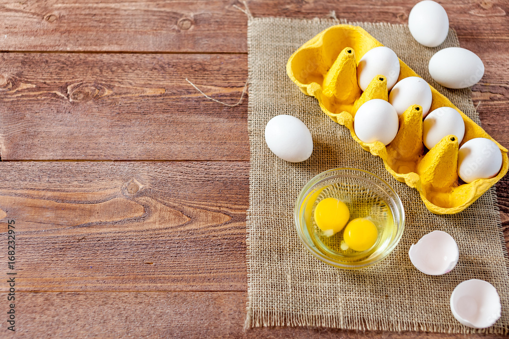 Fresh eggs on wood background. Copy space. Top view Fresh eggs on wood background. Copy space. Top view