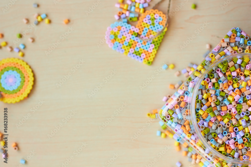 Fototapeta premium Background for needlework. Fine multicolored mosaic