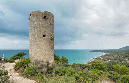 Torre de centinela situada sobre un acantilado. Torre Badum en la Sierra de Irta. Pe    scola  Castell  n . Espa  a.