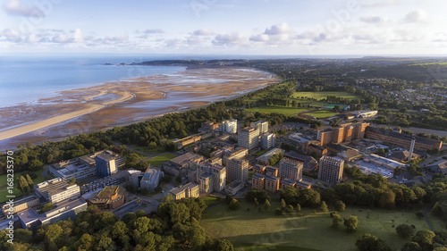 Editorial SWANSEA, UK - AUG 15, 2017: Swansea West, looking towards The Mumbles from Singleton Park, showing the university, Singleton hospital and the bay.