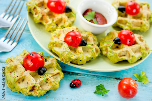 Cherry tomatoes ladybugs on spinach waffles