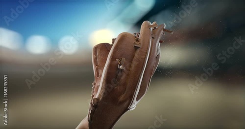Great Baseball Catching A baseball glove catches a ball in a slow-motion shooting, deformed gloves and dust and small particles