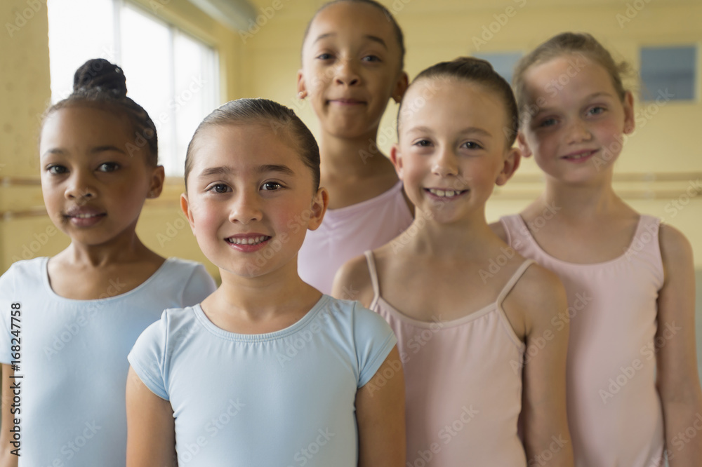 Portrait of smiling girls in ballet studio Portrait of smiling girls in ballet studio