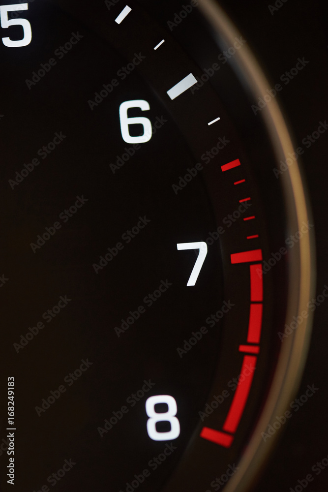 Close-up of car tachometer