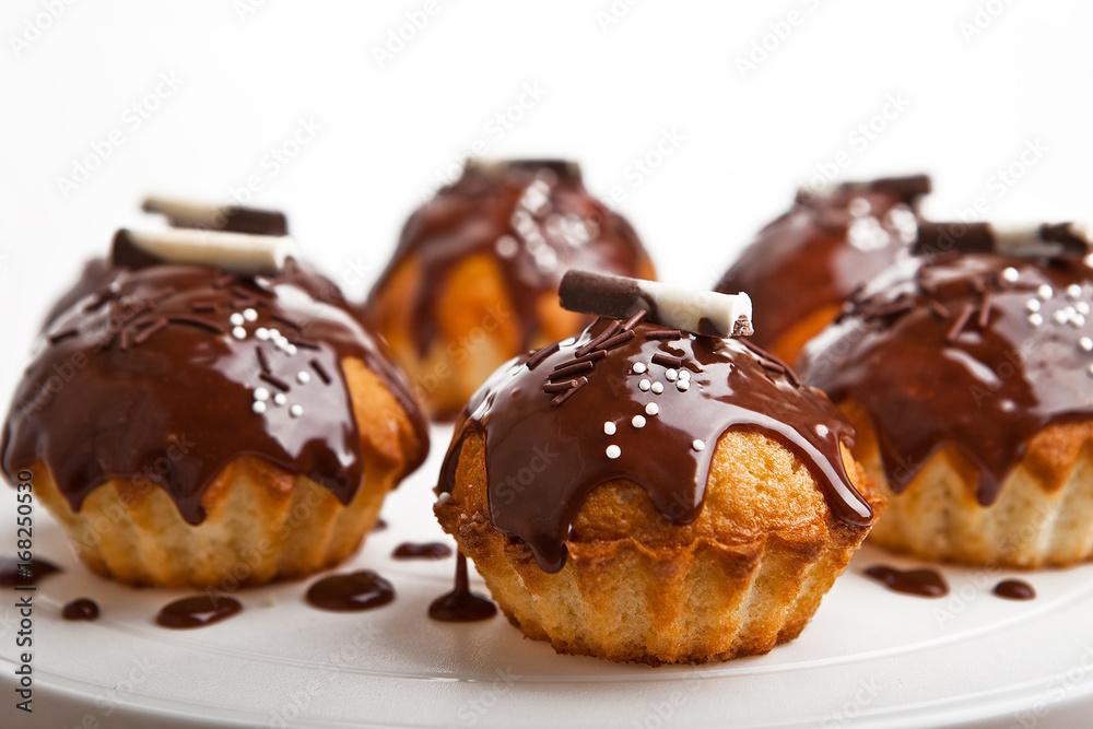 Cupcakes a chocolate glaze. Homemade pastries.
