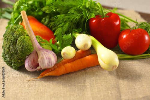 Fresh vegetables on a wooden table. Healthy food. Diet