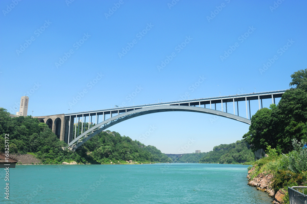 Naklejka premium low angle view of bridge cross the river valley