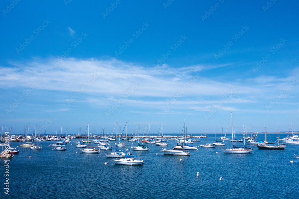 Boats in the water with blue sky in California