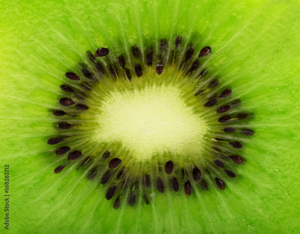 Close Up Kiwi Texture, Kiwi Fruit with macro lens. Center of Transparent Slice. Close Up Kiwi Texture, Kiwi Fruit with macro lens. Center of Transparent Slice.
