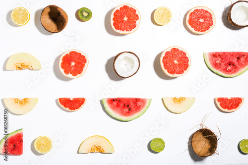 Fototapeta Naklejka Na Ścianę i Meble -  Creative layout made pineapple, watermelon, coconut, melon, grapefruit, lemon, kiwi