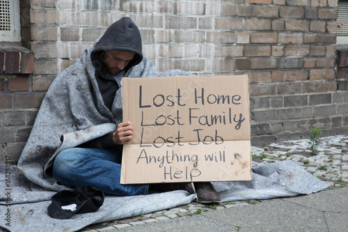 Fotografie Homeless Man Asking Help On Street