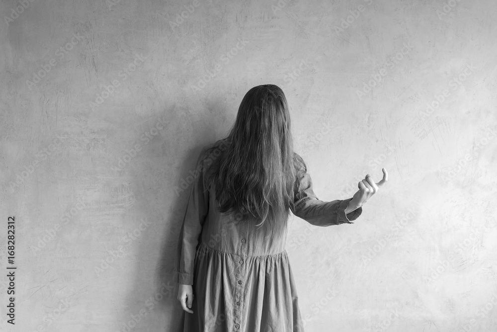 Evil woman beckoning someone Evil woman beckoning someone