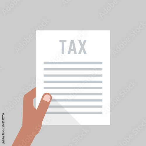 dark-skinned hand holding tax form