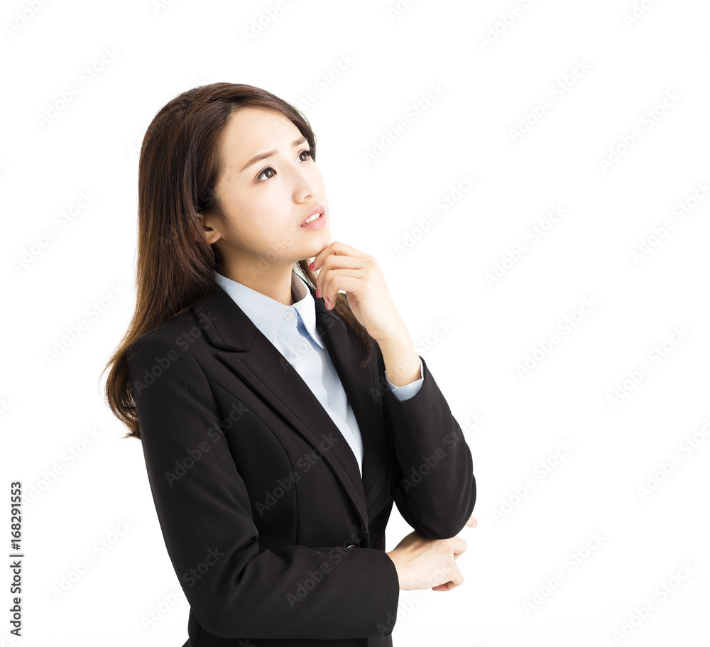 young business woman thinking and looking up young business woman thinking and looking up