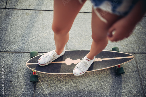 Female teenager skateboarding