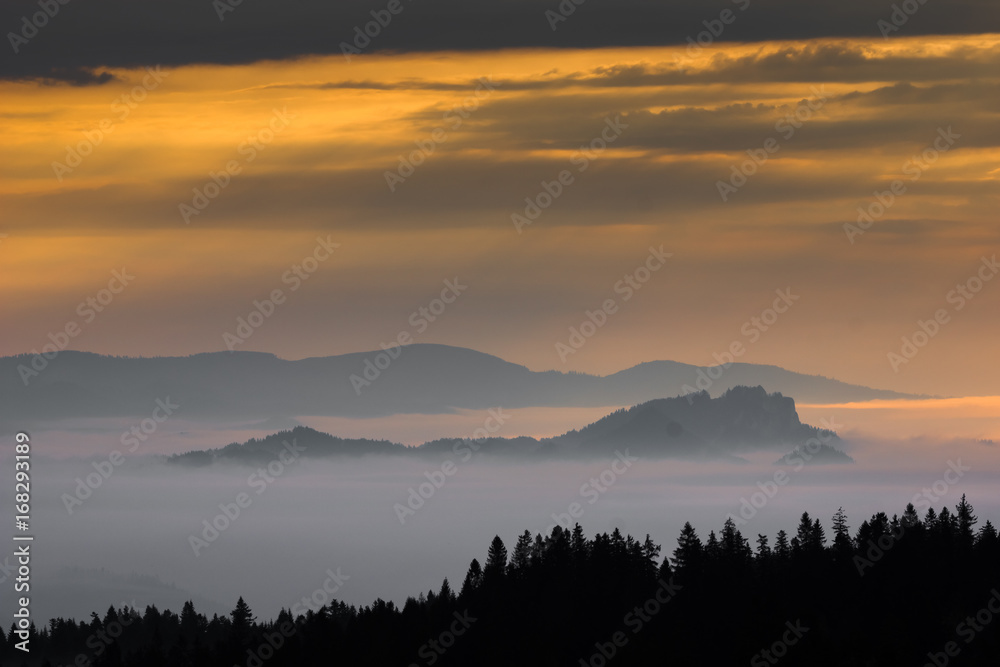 Sunrise and foggy morning over Pieniny mountains from Czarna Gora, Zakopane, Poland
