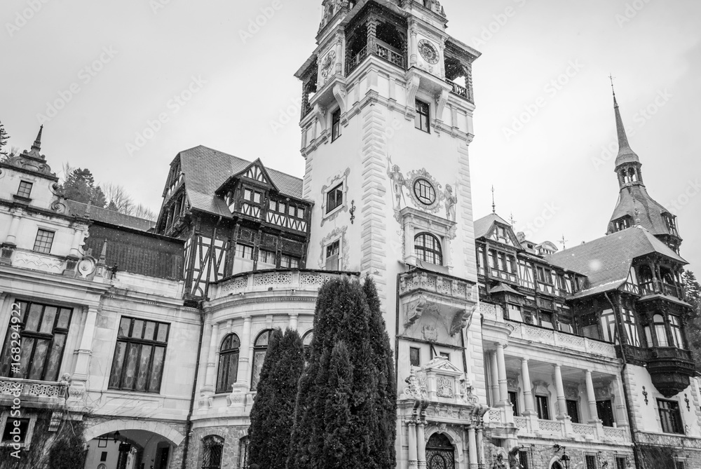 Pelesh Palas in Romania, Sinaia, covered with snow, black and white photo