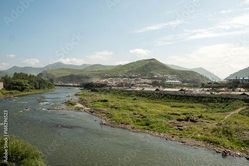 Hyesan in Ryanggang province of North Korea. The city has a population of approximately 200.000 and is set on the bank of the Yalu river on the border to Changbai, China. photo