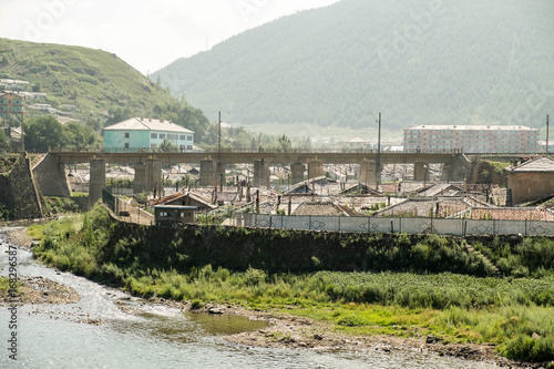 Hyesan in Ryanggang province of North Korea. The city has a population of approximately 200.000 and is set on the bank of the Yalu river on the border to Changbai, China. photo