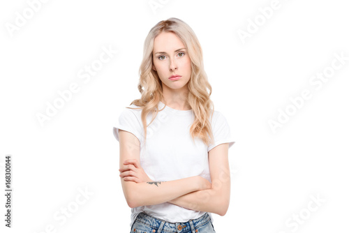 Young woman with arms crossed
