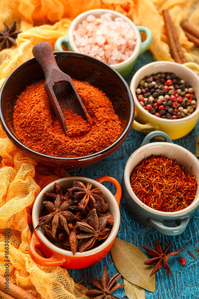 Spices and condiments in small bowls