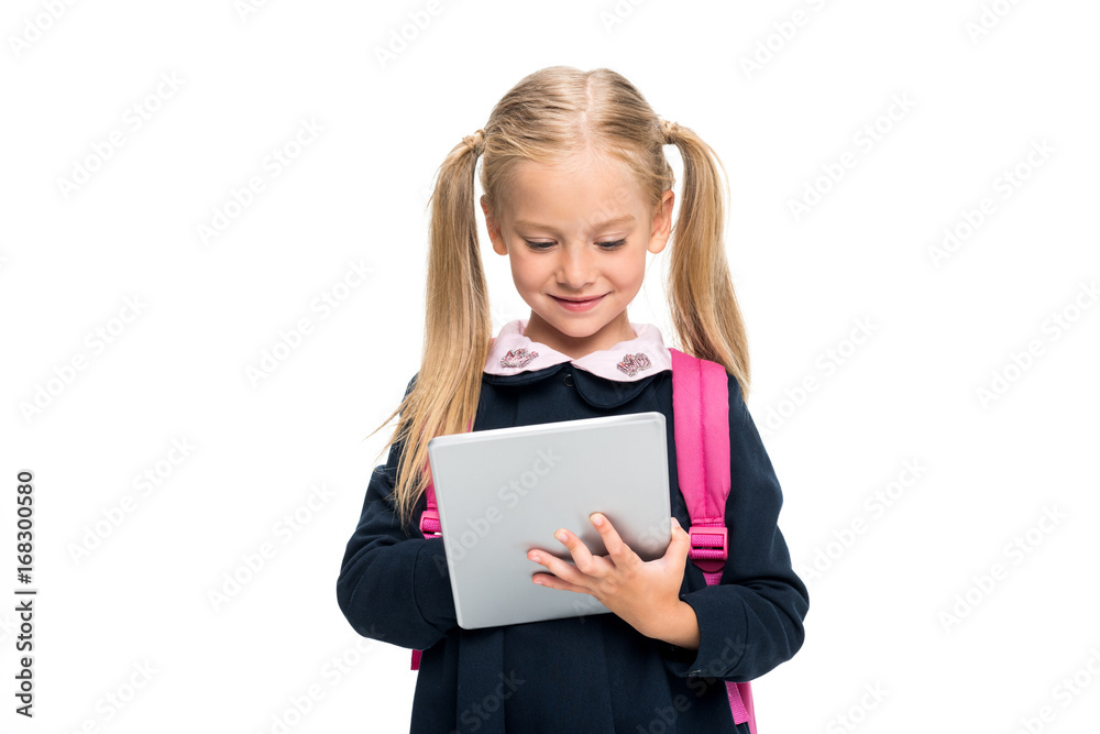 schoolgirl using digital tablet schoolgirl using digital tablet