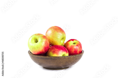 Pink lady aples in a wooden bowl