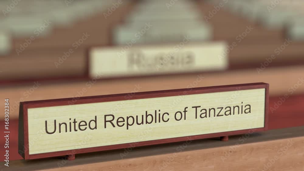 United Republic of Tanzania name sign among different countries plaques at international organization. 3D rendering United Republic of Tanzania name sign among different countries plaques at international organization. 3D rendering