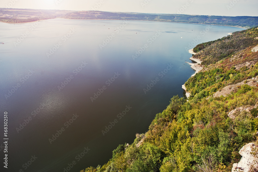 Absolutely stunning, breathtaking and picturesque view of lake surrounded by hills and mountains. Absolutely stunning, breathtaking and picturesque view of lake surrounded by hills and mountains.