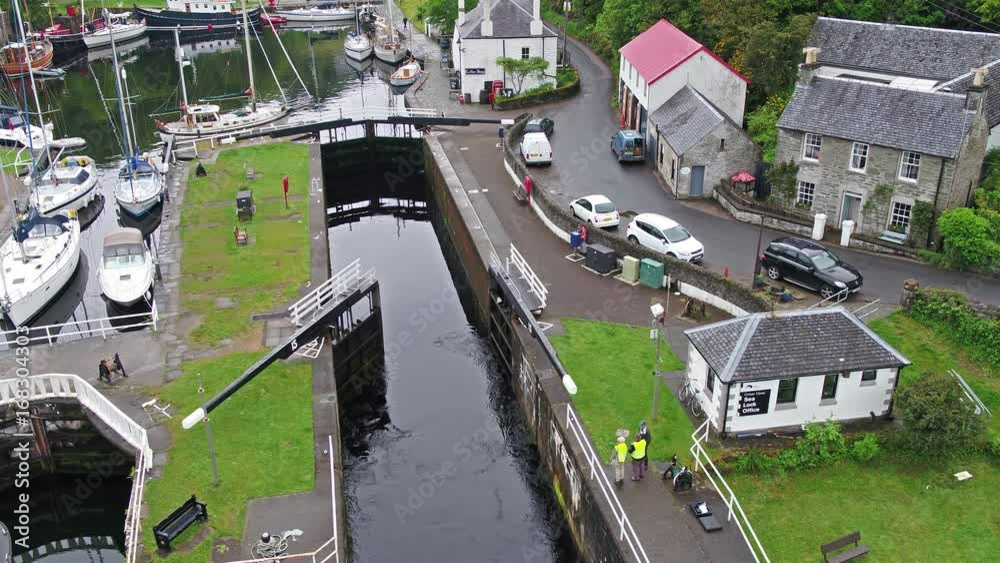 Aerial view of the beautiful historic harbour village of Crinan - Locks opening Part 01 Aerial view of the beautiful historic harbour village of Crinan - Locks opening Part 01
