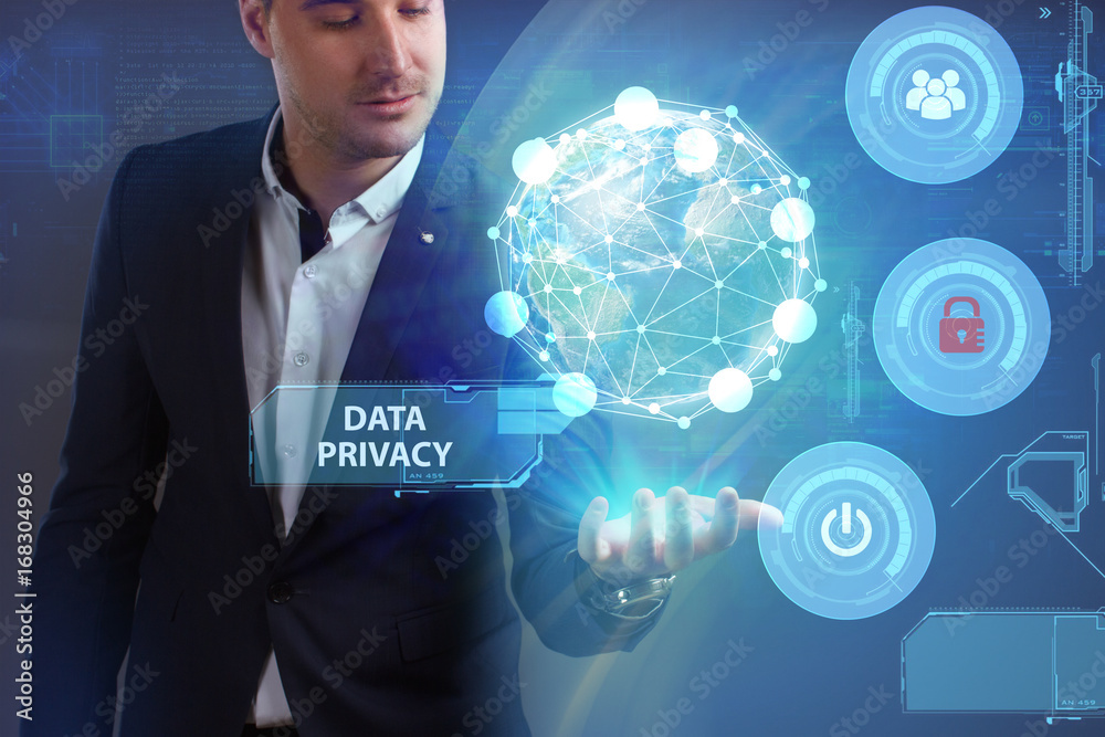 Business, Technology, Internet and network concept. Young businessman working on a virtual screen of the future and sees the inscription: Data privacy Business, Technology, Internet and network concept. Young businessman working on a virtual screen of the future and sees the inscription: Data privacy