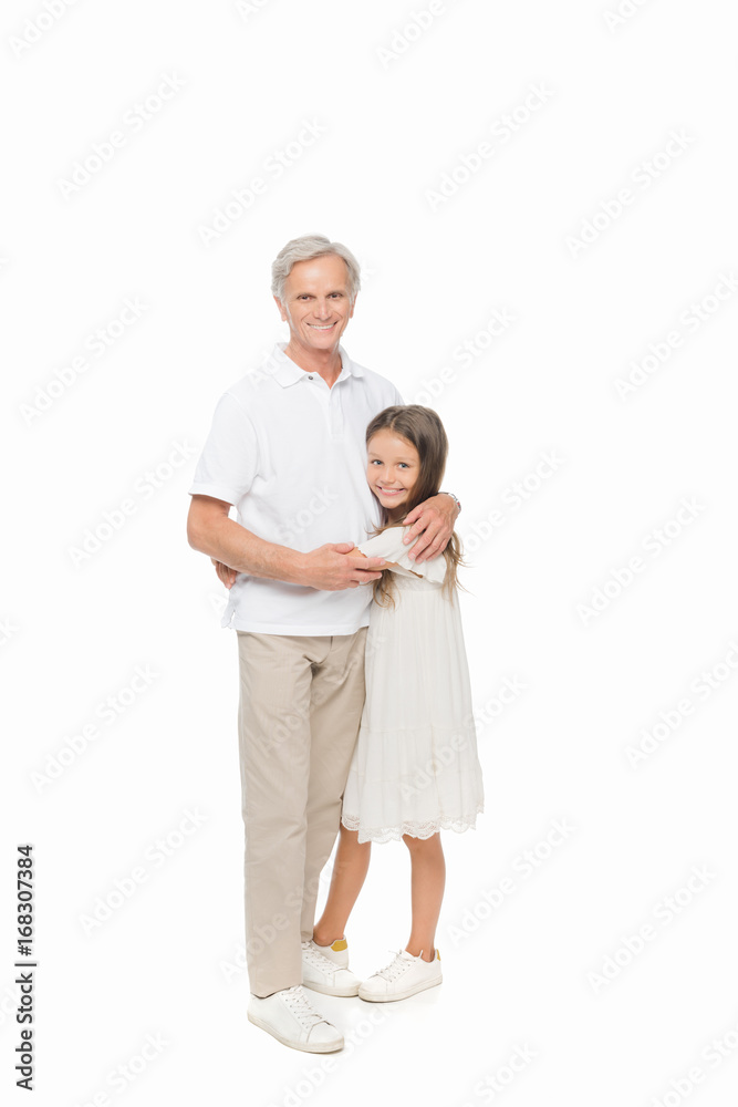 girl embracing with grandfather