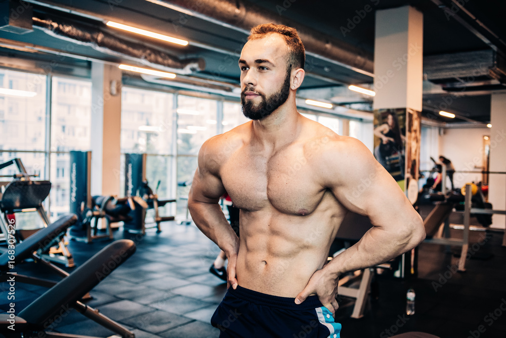 Muscular guy in the gym Muscular guy in the gym